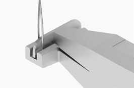 Banding pliers clamping down on wire